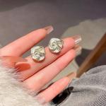 LATS Black Flower Stud Earrings