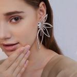 Exaggerated Zircon Butterfly Wings Earrings – Luxury Stud Design for Women, Perfect for Parties.